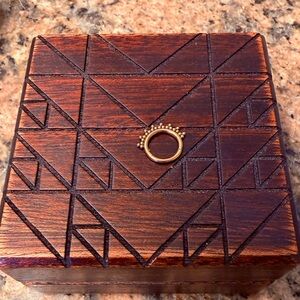 Implant grade titanium anodized bronze clicker with beaded details!